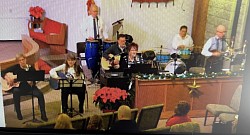 Lindsey Mills with Worship Band and 2 guest guitarists Deacon Sandra and Barbara.  Lar-Congas, Ray-Guitar, Robin-Drums, Brian-Mandolin, Lindsey-Piano
